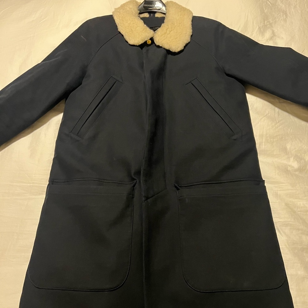 Size small but fits like medium trench count with shearling removable lining